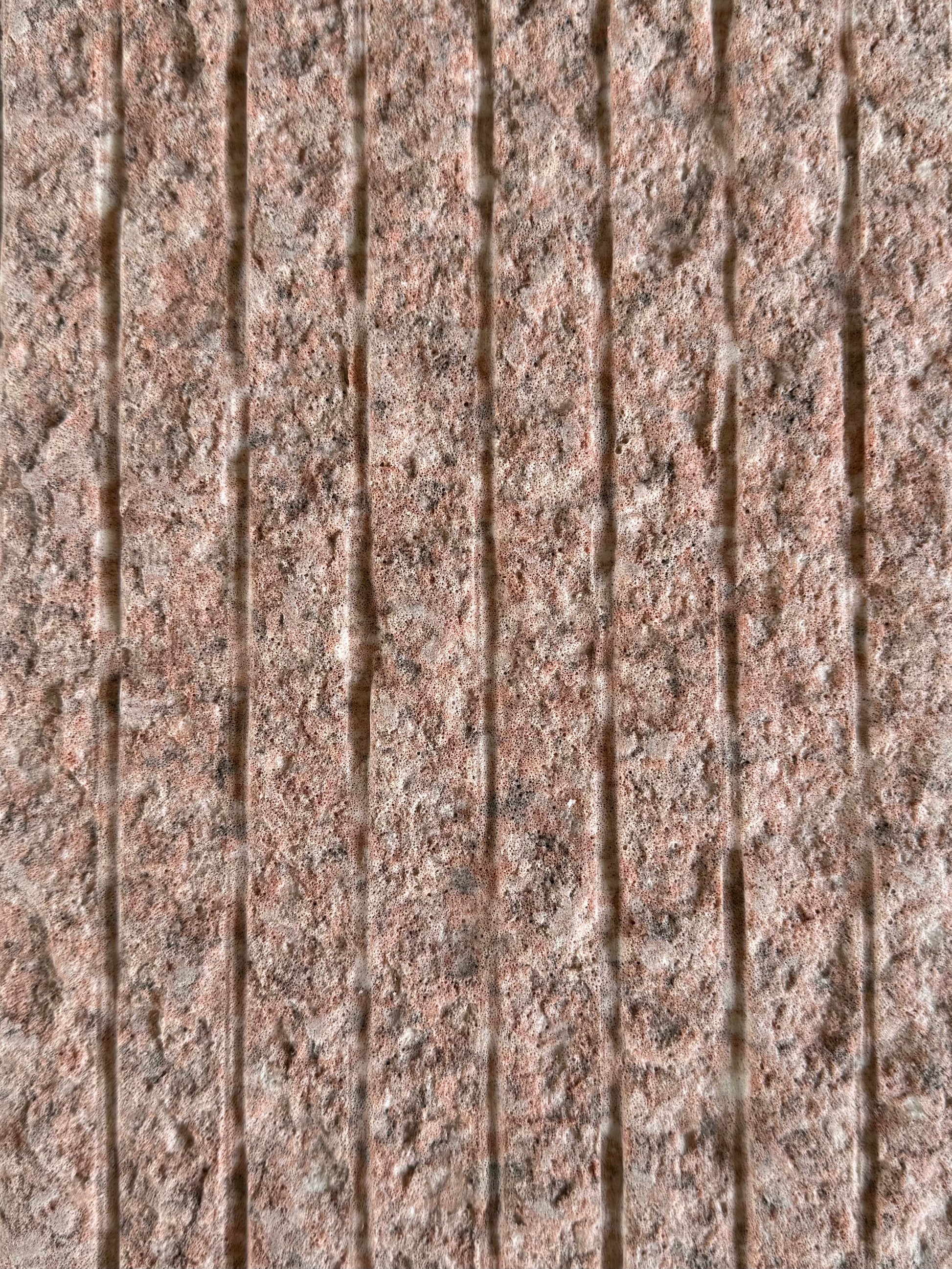 Linear red granite